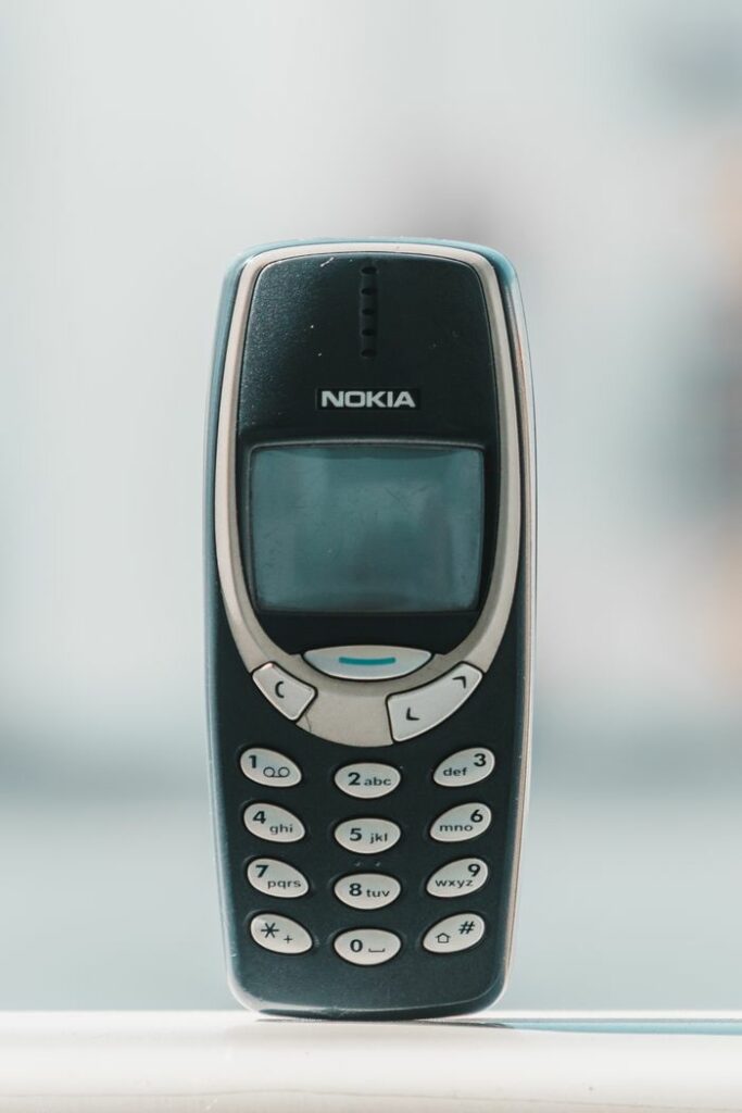 Retro Nokia 3310 cell phone shown in a classic front view, capturing its vintage charm.